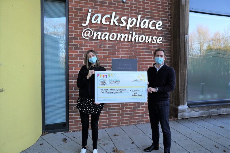 hbs group southern present donation cheque to naomi house hospice this christmas
